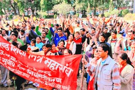 Part-time teachers under the banner of Uttarakhand Shiksha Mitra Mahasangh hold a demonstration in Dehradun