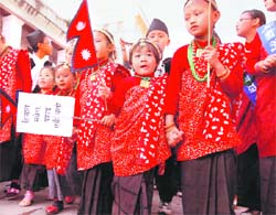 Kids from Gurung community take part in a parade to mark Lhosar festival in Kathmandu on Tuesday.