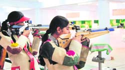 Shooters takes aim on the final day of All-India Inter University Shooting Championship in Dehradun on Wednesday. 