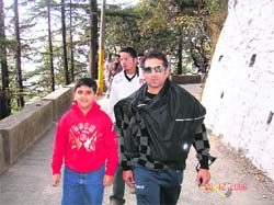 Sachin takes a walk with a young fan in Mussoorie