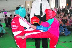Players in action at the Open Inter-State Kick Boxing Championship in Dehradun on Wednesday.