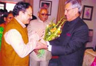 Maj Gen BC Khanduri (retd) greets Uttarakhand Governor BL Joshi on New Year in Dehradun on Thursday.