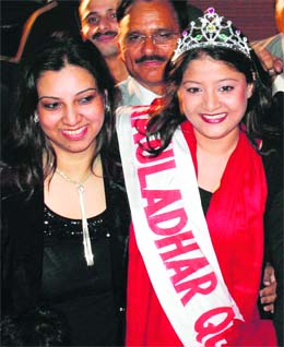 Dr Priyanka is all smiles after being crowned Miss Dhauladhar on New Year eve at Dharamsala on Wednesday.
