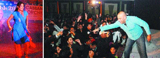 TV actor Sonia Kapoor dances as pop singer Baba Sehgal involves crazy fans during his performance on the eve of New Year at Club Cabana near Jalandhar