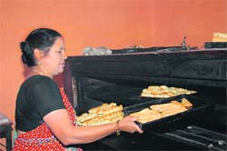 Sumati at her bakery .