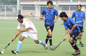 Players in action during semi-final match in Canada Hockey Gold Cup at the PAU