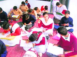 Students from various schools taking part in an inter-school competition at Nurpur on Saturday.