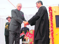 Governor NN Vohra greets Chief Justice Barin Ghosh at the latters oath-taking ceremony at Raj Bhawan in Jammu on Saturday.