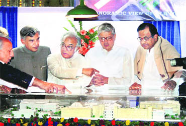 Union Home Mnister P Chidambaram (extreme right) looks at a replica of Old Mint revamped into a museum as part of a Rs-147 crore project.  PTI 