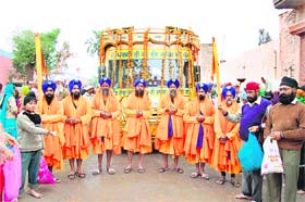 The Panj Piaras lead a nagar kirtan on the eve of the Parkash Utsav of Guru Gobind Singh in Sirsa