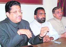 Suryakant Dhasmana (left), media in charge of the state Congress Committee, addresses mediapersons at the Haridwar Press Club