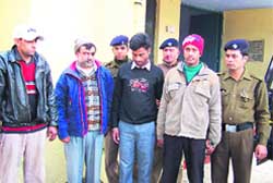 The four accused arrested in connection with the murder of junk dealer Mehboob at Vikasnagar police station.
