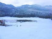 Khajjiar Lake under snow.