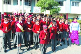 Students of CJS Public School during a peace march in their school. 
