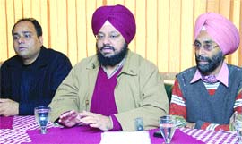 Amardeep Singh Cheema addresses a press conference in Jalandhar. 