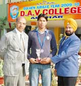 Nishant Monga, a student of BCA in DAV College, Abohar, was felicitated by principal B.B. Sharma (left) and Sarabjit Singh, in charge of the Physical Education department