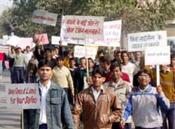 School students participate in a rally during the road safety week in Gurgaon 