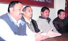Leader of Opposition Sanjay Sharma, along with the other ward members, speaks to mediapersons in Haridwar on Wednesday.