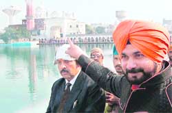 BJP MP Navjot Singh Sidhu with members of the BJP team that visited the Golden Temple in Amritsar