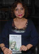 Kamlesh Chauhan shows her book Saat Samunder Paar