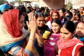 Harsimrat Kaur Badal greeting people during a public meeting in Bathinda on Thursday.
