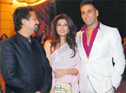 Nikhil Advani, actor Twinkle Khanna and Akshay Kumar arrive at a screening of the feature film Chandi Chowk To China at Warner Bros. studios in Burbank, 