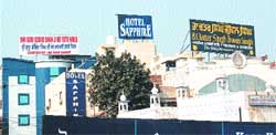Huge hoardings on high-rise buildings near Golden Temple in Amritsar