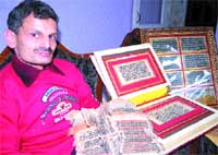 Rajnish Khosla shows the rare handwritten manuscripts, which he has conserved with
