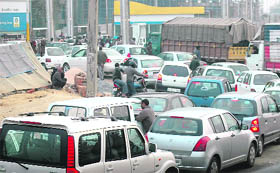 A long queue of vehicles at a petrol station in Gurgaon on Friday following the strike by employees of oil companies.