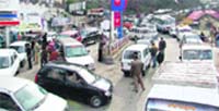 Long queues for petrol could be seen at almot every filling station at Shimla