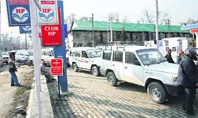 A long queue of vehicles at a filling station in Srinagar