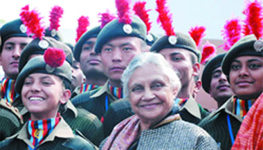 Chief Minister Sheila Dikshit poses with NCC cadets at NCC Republic Day Camp in New Delhi 