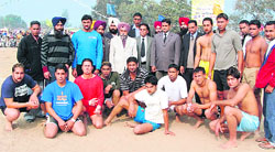 Players of kabaddi open championship pose with the chief guest.