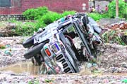 A Balero which had fallen in the Rispana in Dehradun.