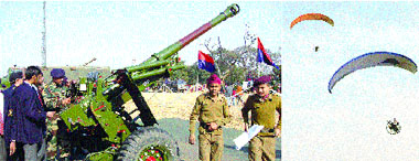 Army personnel demonstrate tanks to students and paragliders doing their rounds on the occasion of Army Day in Jalandhar