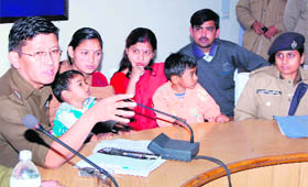 SSP Sanjay Gunjyal and ASP Sweety Aggarwal with the parents of the rescued children in Haridwar.