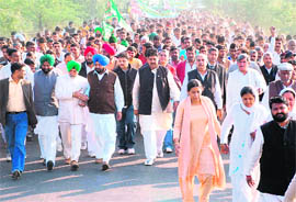 Supporters take part in the janakrosh yatra led by Ajay Chautala near Narnaul on Wednesday.