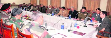 Chief Minister Omar Abdullah (extreme right) presides over a meeting of the Unified Command to review the security situation in Jammu