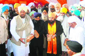 Baba Ram Pal Singh, Sant Jasvir Singh and Baba Balvir Singh among others during the laying of foundation stone of Baba Banda Singh Bahadur Memorial Hall at Raqba village, Ludhiana on Wednesday.