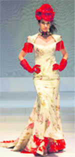 A model displays a creation by Gianni Castelli at the Hong Kong Fashion Week for 