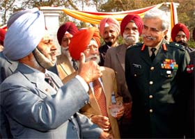 Lt General D.S.Chauhan, commander of the Chetak Corps, interacting with ex-servicemen at an Army Day function at Bathinda Military Cantonment