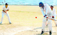 A batsman is trapped leg before wicket at the District Inter-School Tournament in Haridwar