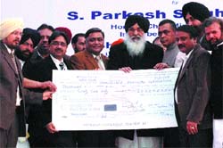 Chief Minister Parkash Singh Badal releases Rs 20 crore for the overbridge project in Jalandhar on Thursday.