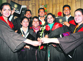 Students of College of Agriculture in a jovial mood after getting their degrees in Ludhiana on Thursday.