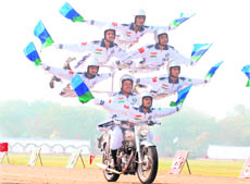 Army daredevils show their skills during the Army Day celebrations at the Army Parade Ground in New Delhi on Thursday.
