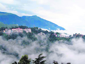 Clouds hovering over McLeodganj at Dharamsala on Friday.