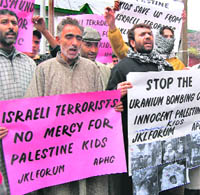 JKLF members shout anti-Israel slogans during a protest in Srinagar on Friday.