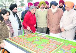 Chief Minister Parkash Singh Badal on Friday inspects the model of a modern jail to be constructed at Faridkot