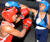 Contestants slug it out on the opening day of boxing contest in Bathinda.