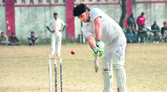 A batsman digs out a yorker at the 57th District Cricket League at Survey Stadium, Dehradun on Saturday.